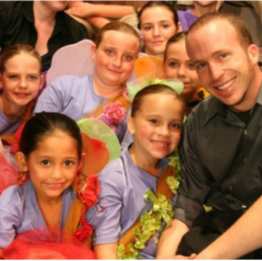 Mr. Hanks with young performers