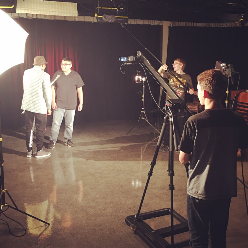 Film 1 students record a scene in the studio.